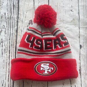Men's San Francisco 49ers New Era Scarlet Main Cuffed Knit Hat with Pom Pom